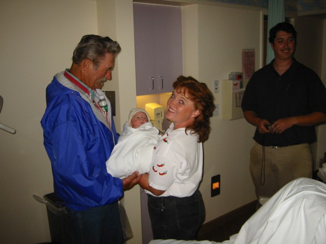 Marvin and Janet holding Trevor for the first time